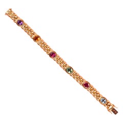 Gold bracelet with gemstones