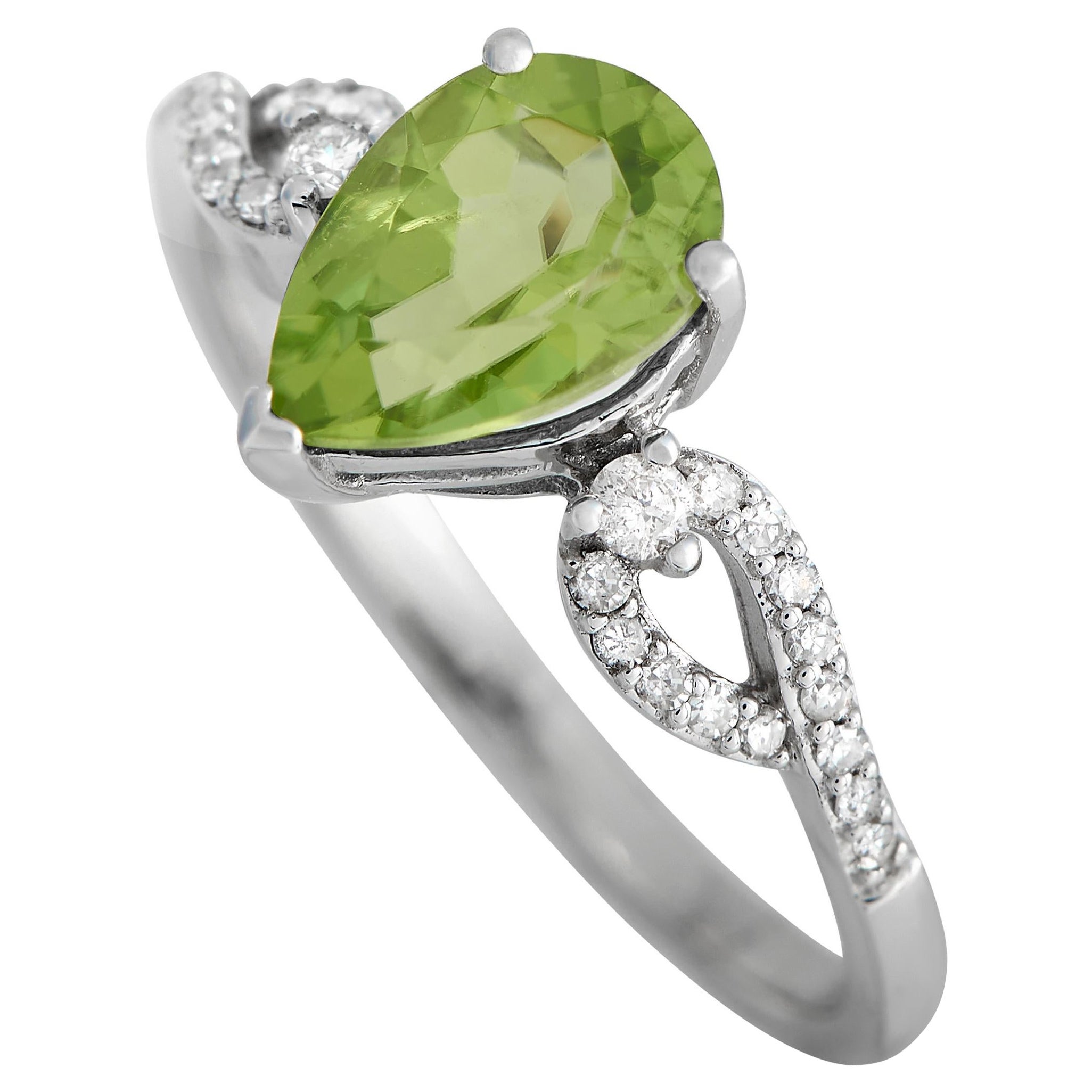 14K White Gold 0.15ct Diamond and Peridot Ring For Sale