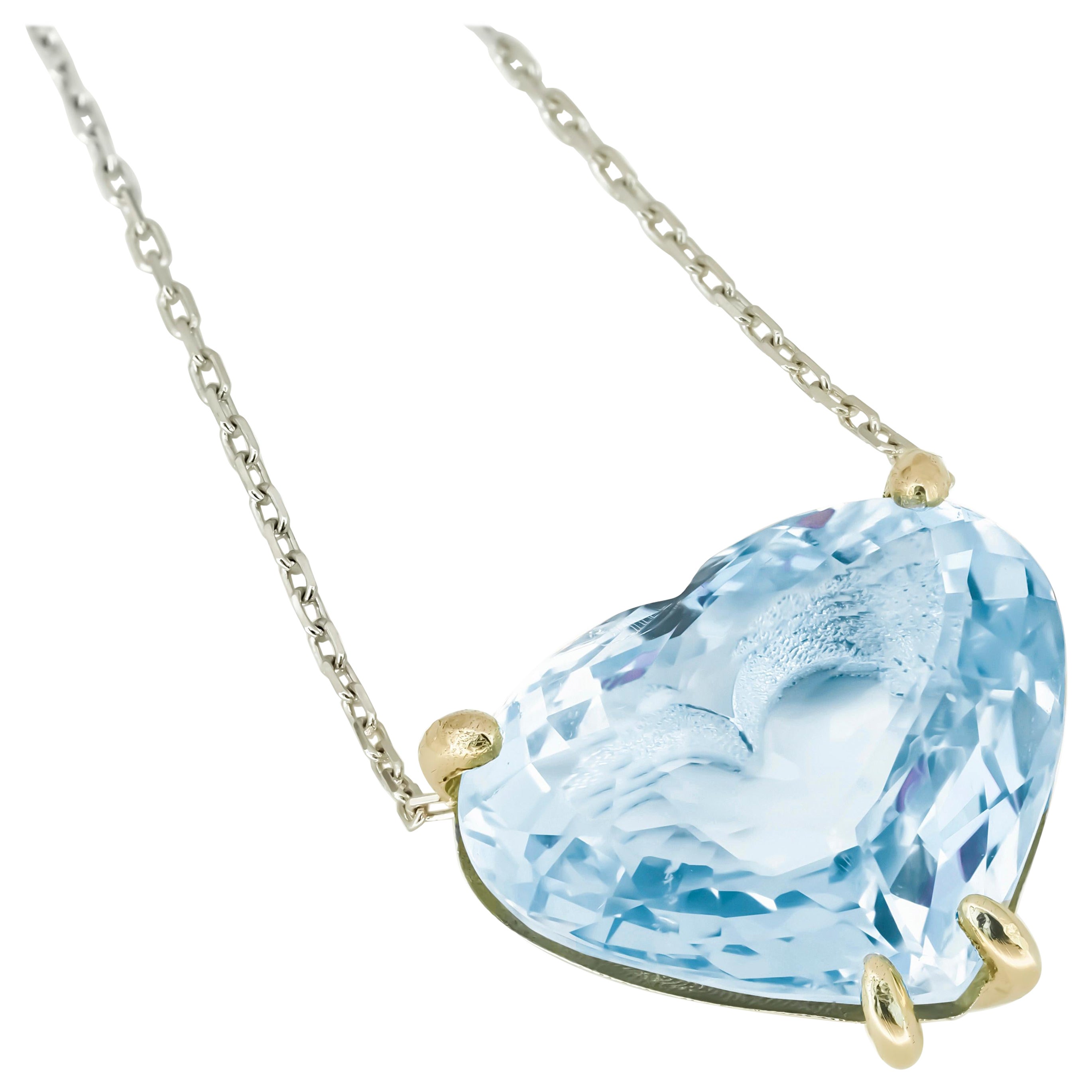 Heart shaped topaz pendant necklace in 14k gold.  For Sale