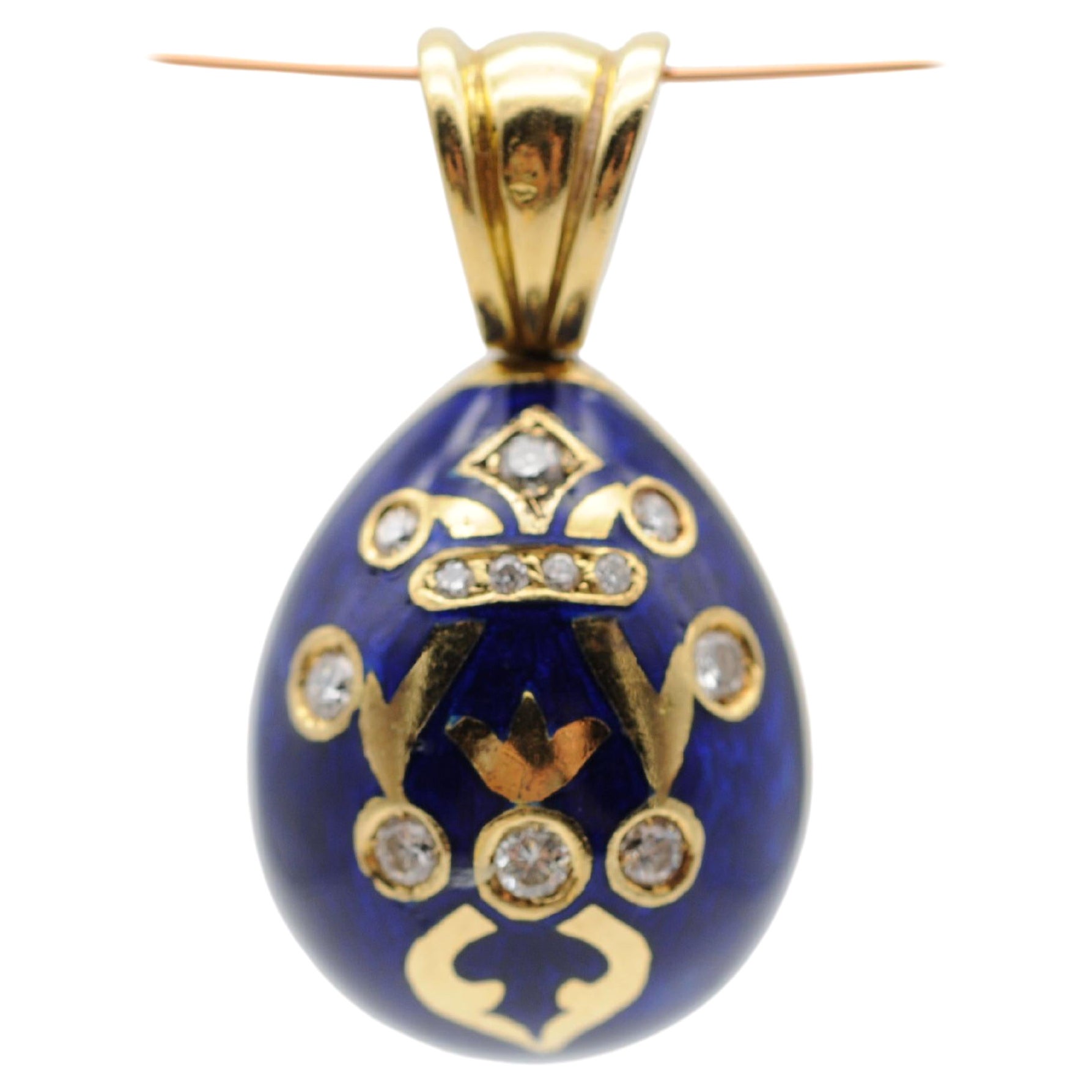 Unique egg pendant with diamonds, 18K yellow gold For Sale