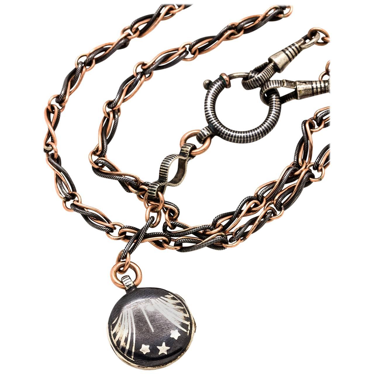 Striking Niello Sterling and Rose Gold Filled Locket and Chain, circa 1920s