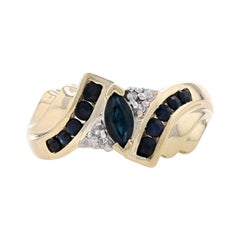 Bypass-Ring aus Gelbgold mit Saphiren und Diamanten - 10k Marquise & Rund .94ctw