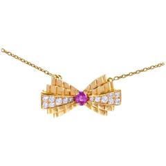 Van Cleef & Arpels Yellow Gold Diamond and Ruby Bow Brooch Pendant Necklace