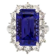 10.24 carat Rectangular Shape Tanzanite in Halo diamond Platinum Setting 4