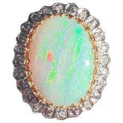 Vintage 18K gold opal diamond halo cocktail ring