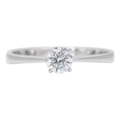 Magnifique bague solitaire en or blanc 18 carats sertie d'un diamant 0,31 carat