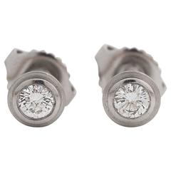 Brand New Platinum Diamond Studs, Bezel-Set with 0.50 carats Diamond