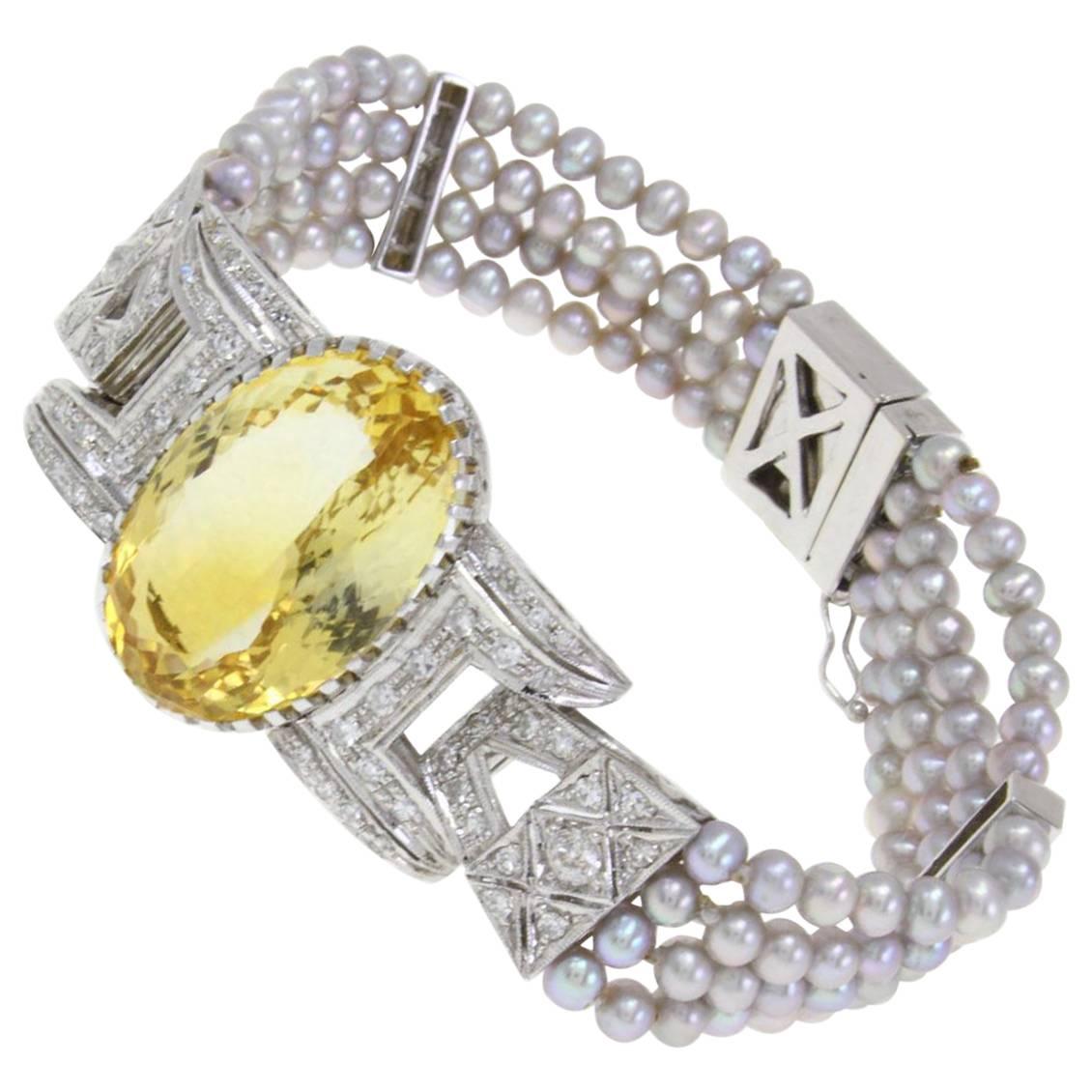 Bracelet en or, topaze, diamant et perle grise