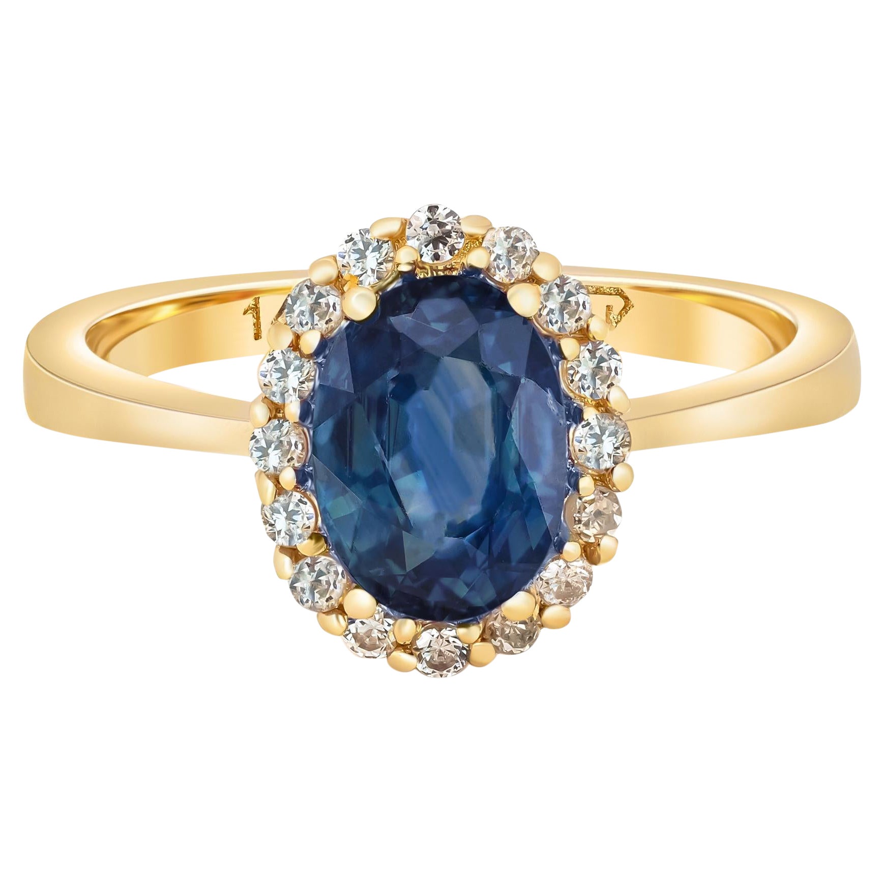 Sapphire ring with diamond halo. For Sale