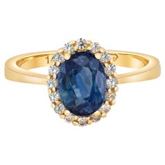 Sapphire ring with diamond halo.