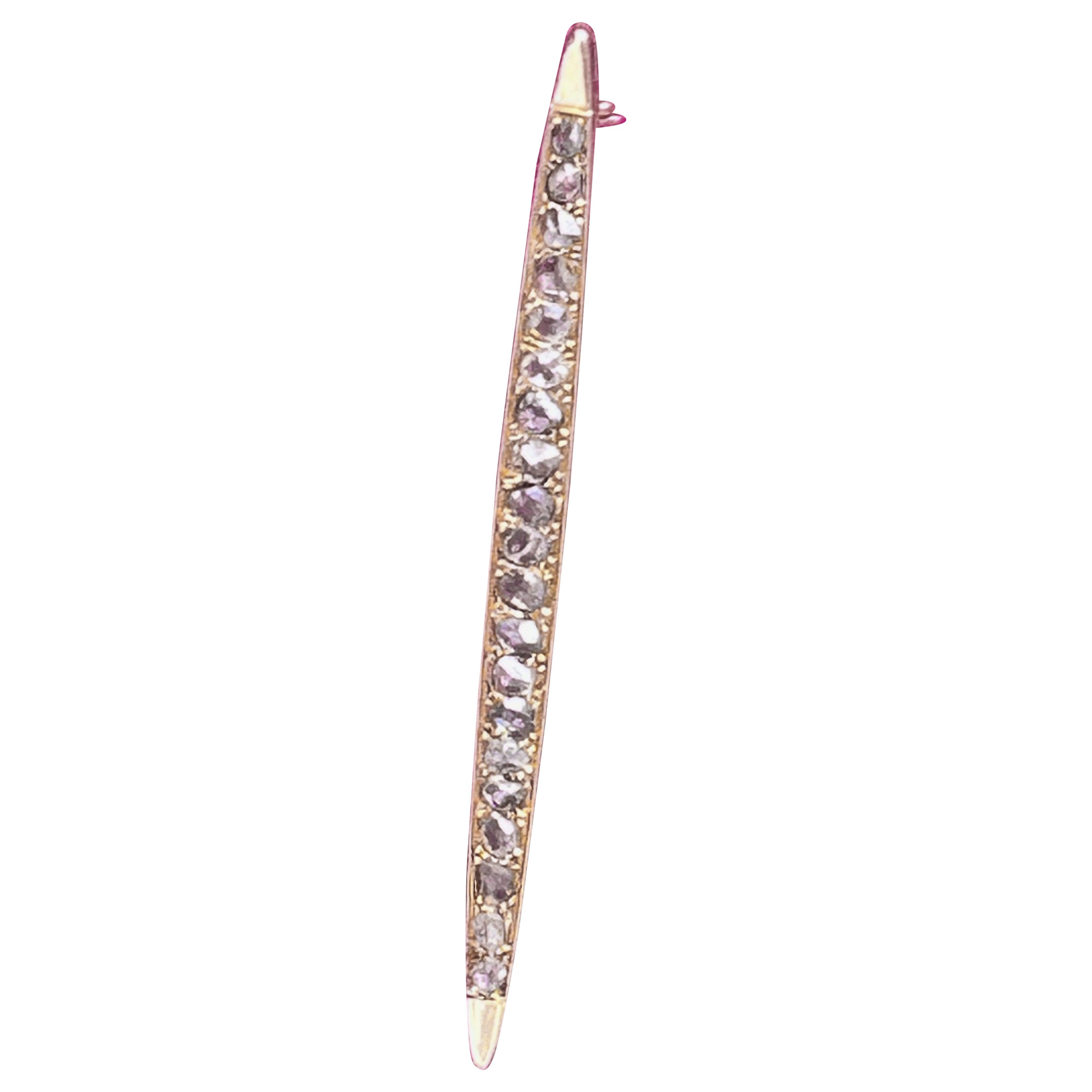 Rose Cut Diamond Bar Brooch set with 20 rose cut diamonds (approx. 3.1mm - 2mm). Approximately 1.5 ctw. Hallmarks: 585 Dutch assay mark.  LxW: approx. 6.8 x 0.5 cm. Weight: 4.47 grams.