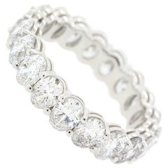 Oval Cut Diamonds and Gold Eternity Band