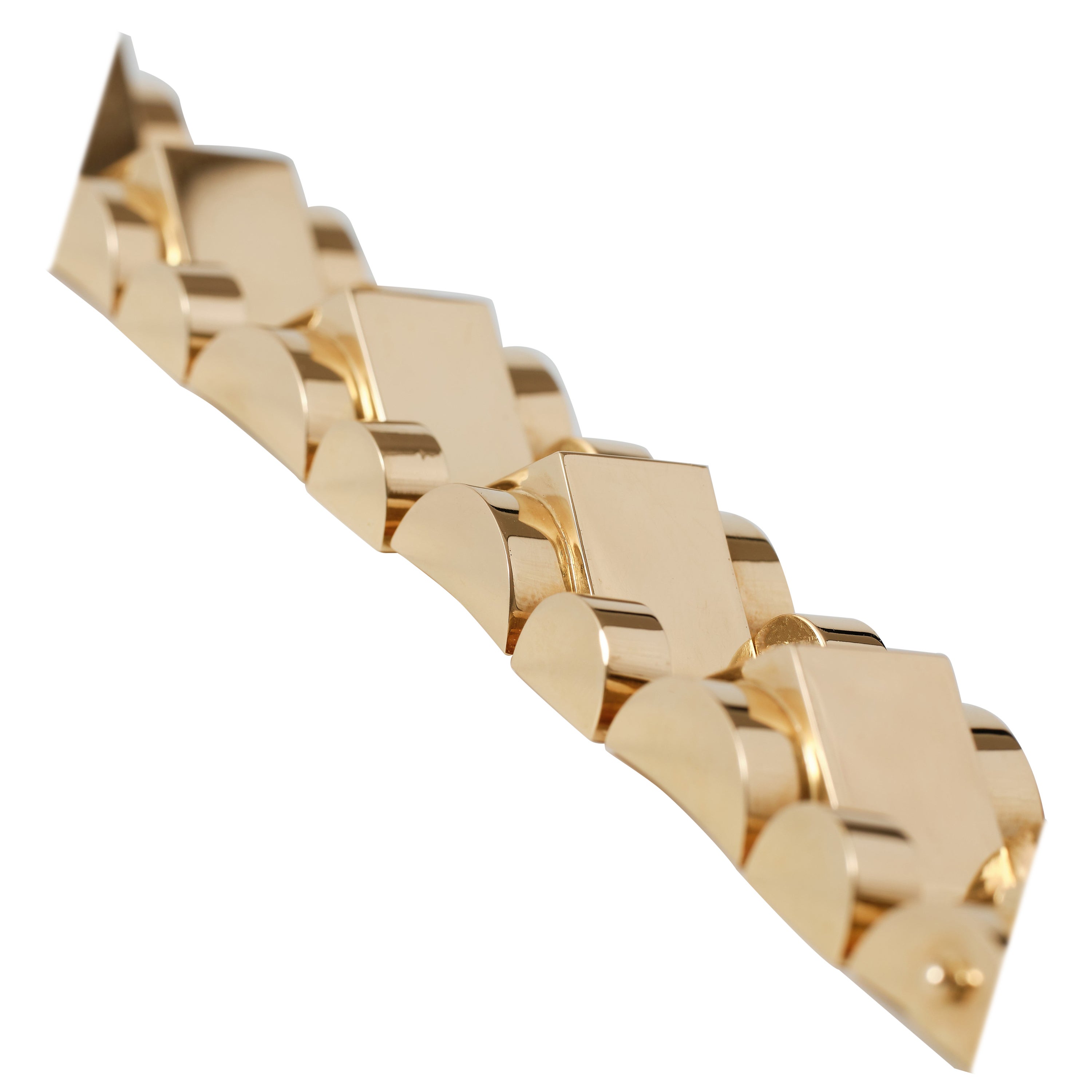 1940s Retro tank bracelet. 

It is composed of pyramidal links flanked by arches. Combining soft bold curves with sharp lines, playfully defying the impression of great weight. Managing to still be graceful. 

The name Tank is in reference to how