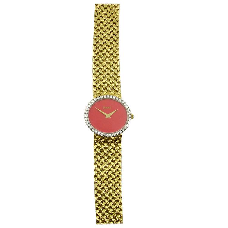 Piaget Coral Dial Diamond Bezel Woven Band Wristwatch For Sale at 1stDibs