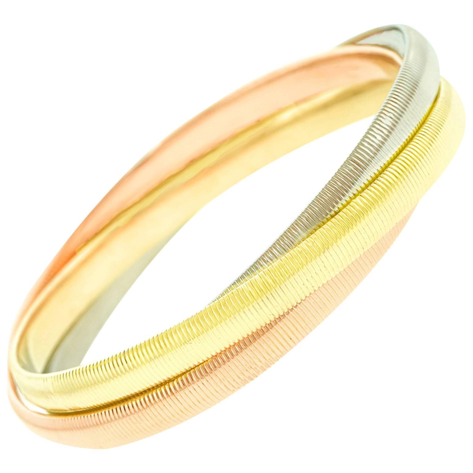 Rare Ribbed Cartier Trinity Gold Bangle