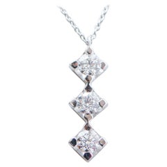 Collier pendentif en or blanc 18 carats et diamants de 0,60 carat.