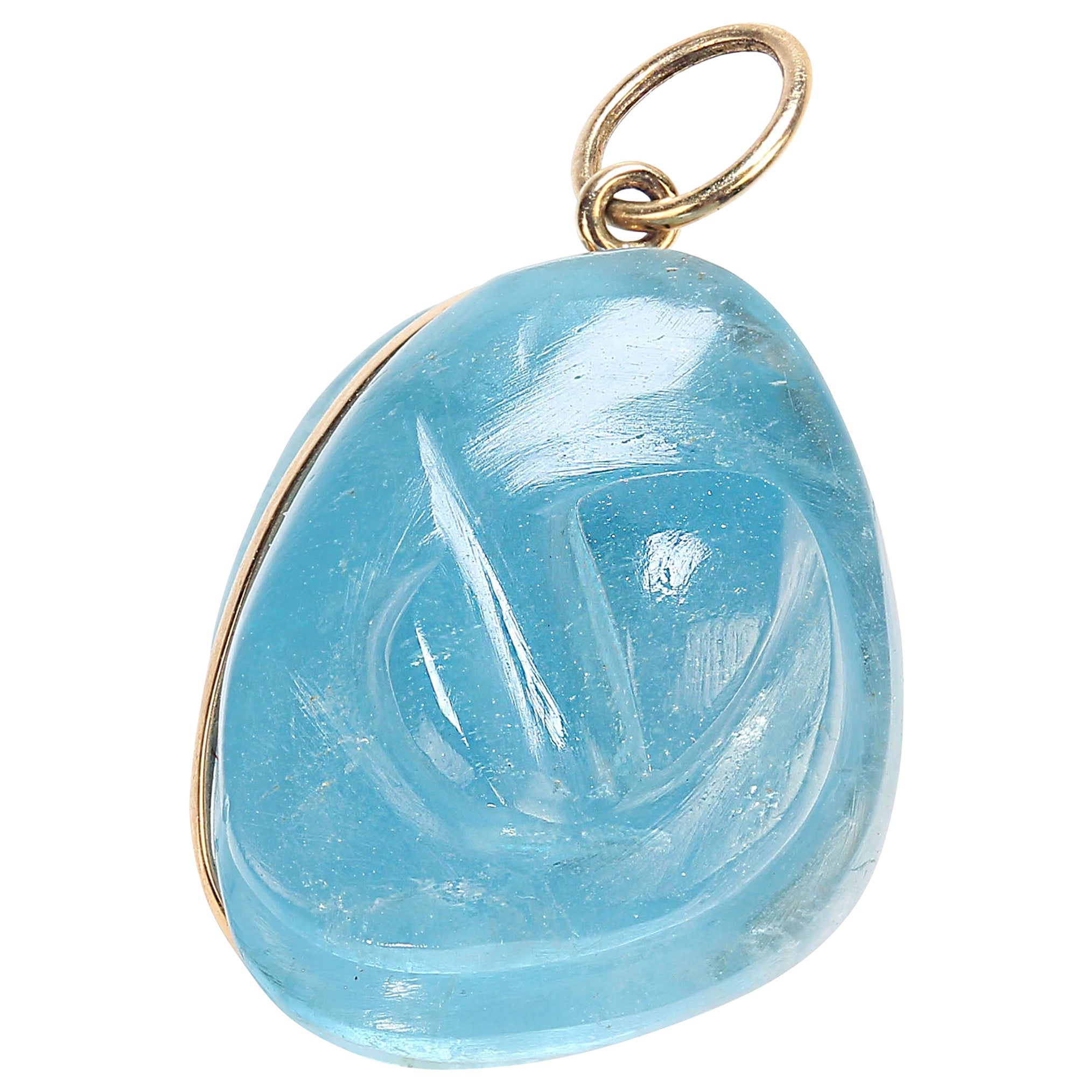 What a find!  This gorgeous Brazilian aquamarine is an intense blue.  What a joy to put on and wear every day. The translucent deep blue is so beautiful.  The gemstone measures approximately 18x15MM and is circled with a gold wire.   It comes on