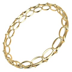 Bracelet en or jaune 5 carats avec ovales et losanges
