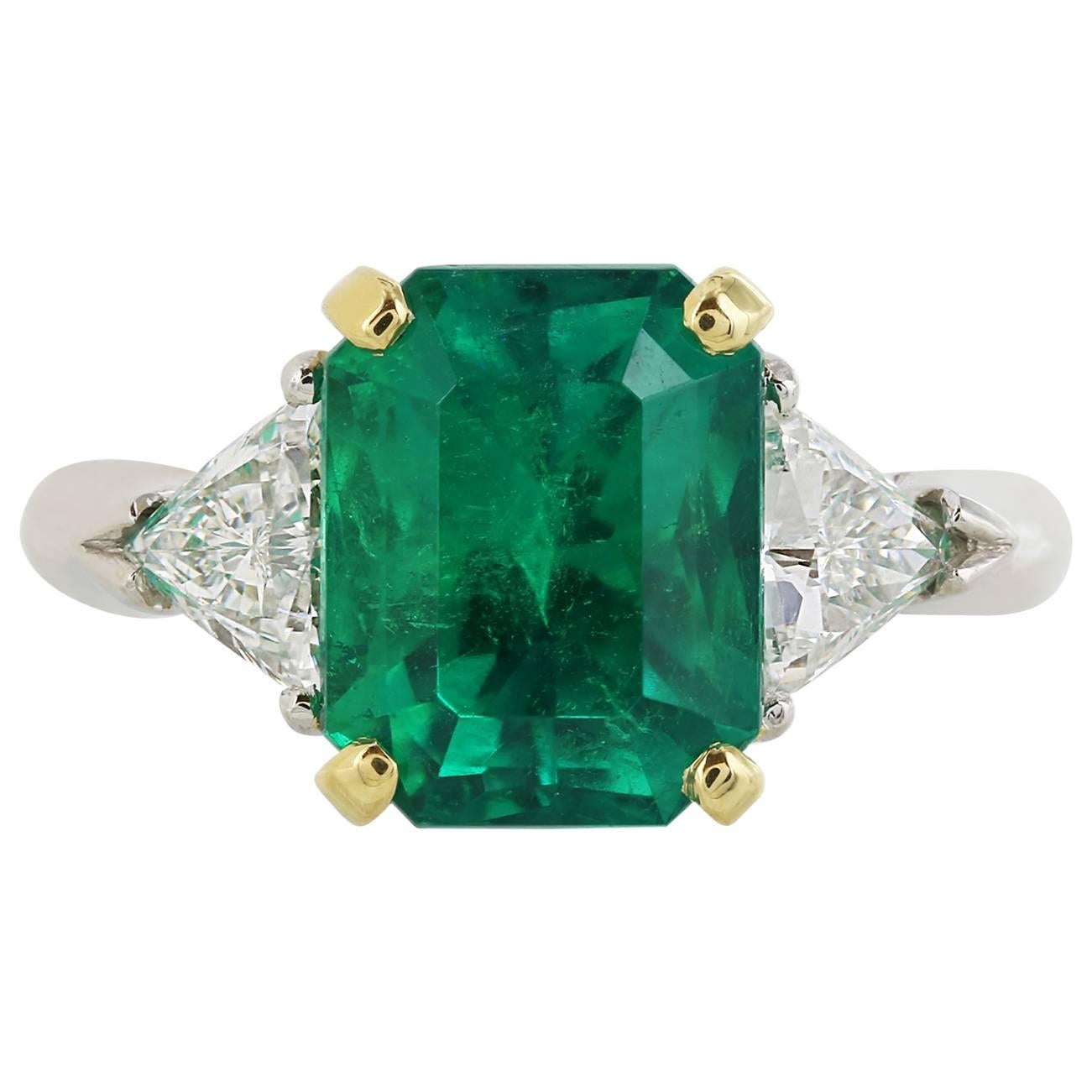 3.54 Carat Emerald .77 Carat Diamonds Platinum Three-Stone Ring For Sale