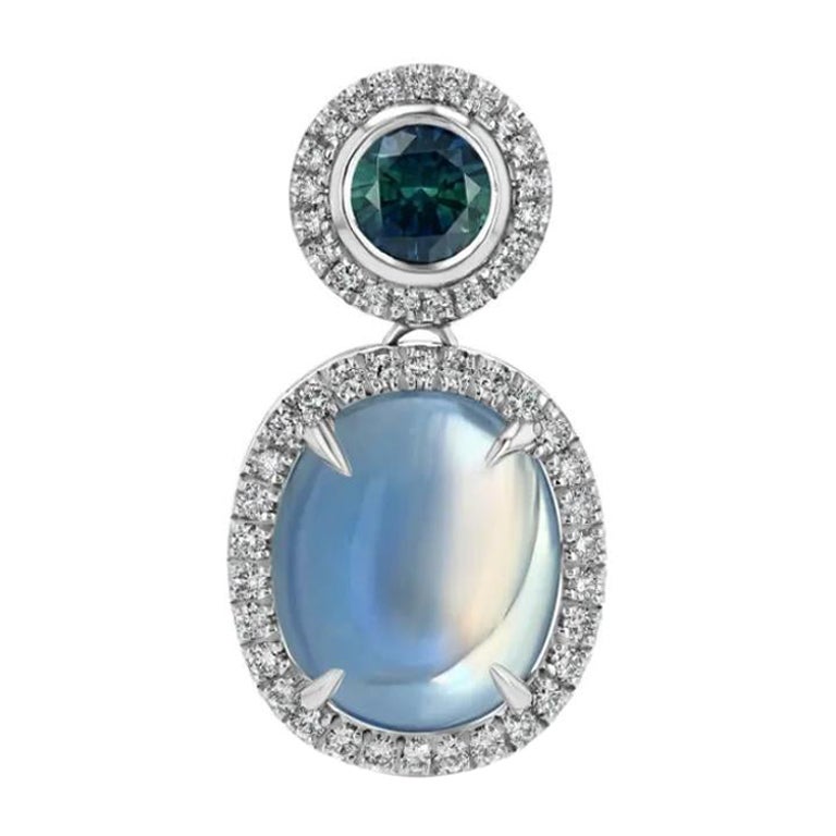 5.44ct Moonstone and 0.63ct Montana Sapphire pendant in 18K white gold. For Sale
