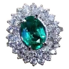 AIG Certified 2.40 Ct Zambian Emerald 2.60 Ct Diamonds 18K Gold Ring