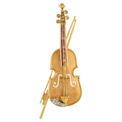 18 Karat Gelbgold 0,15 Karat Diamant und Rubin Violin Brosche MF37-012324