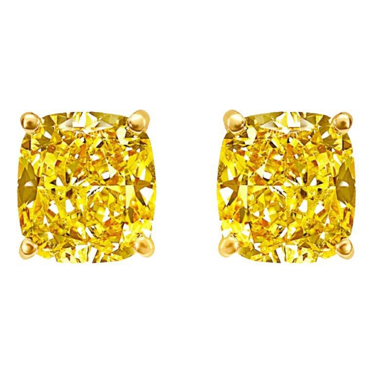 GIA Certified Diamond Studs 4.00 Carat VVS, Fancy Intense Yellow, Cushion Cut For Sale