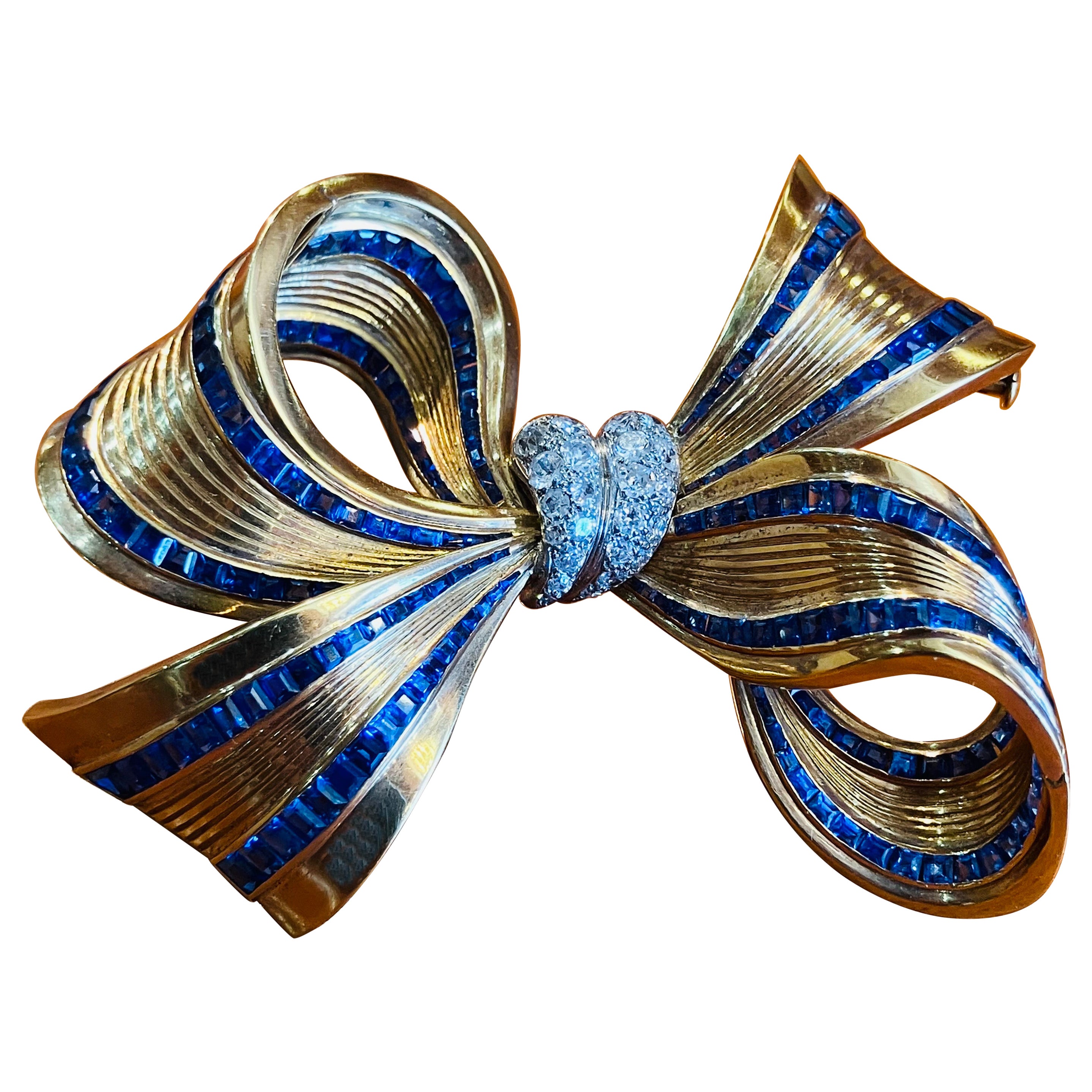 Magnificent Van Cleef & Arpels Retro period Large  Bow Brooch with Invisible Sapphire setting . 
