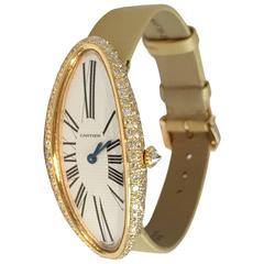 Vintage Yellow gold and diamonds Baignoire Cartier watch.