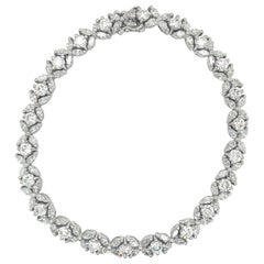 Bracelet tennis vintage en platine avec diamants marquises et ronds