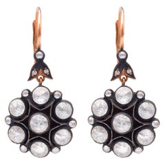 Paire de boucles d'oreilles pendantes en argent et or rose 14k avec diamants de taille rose.