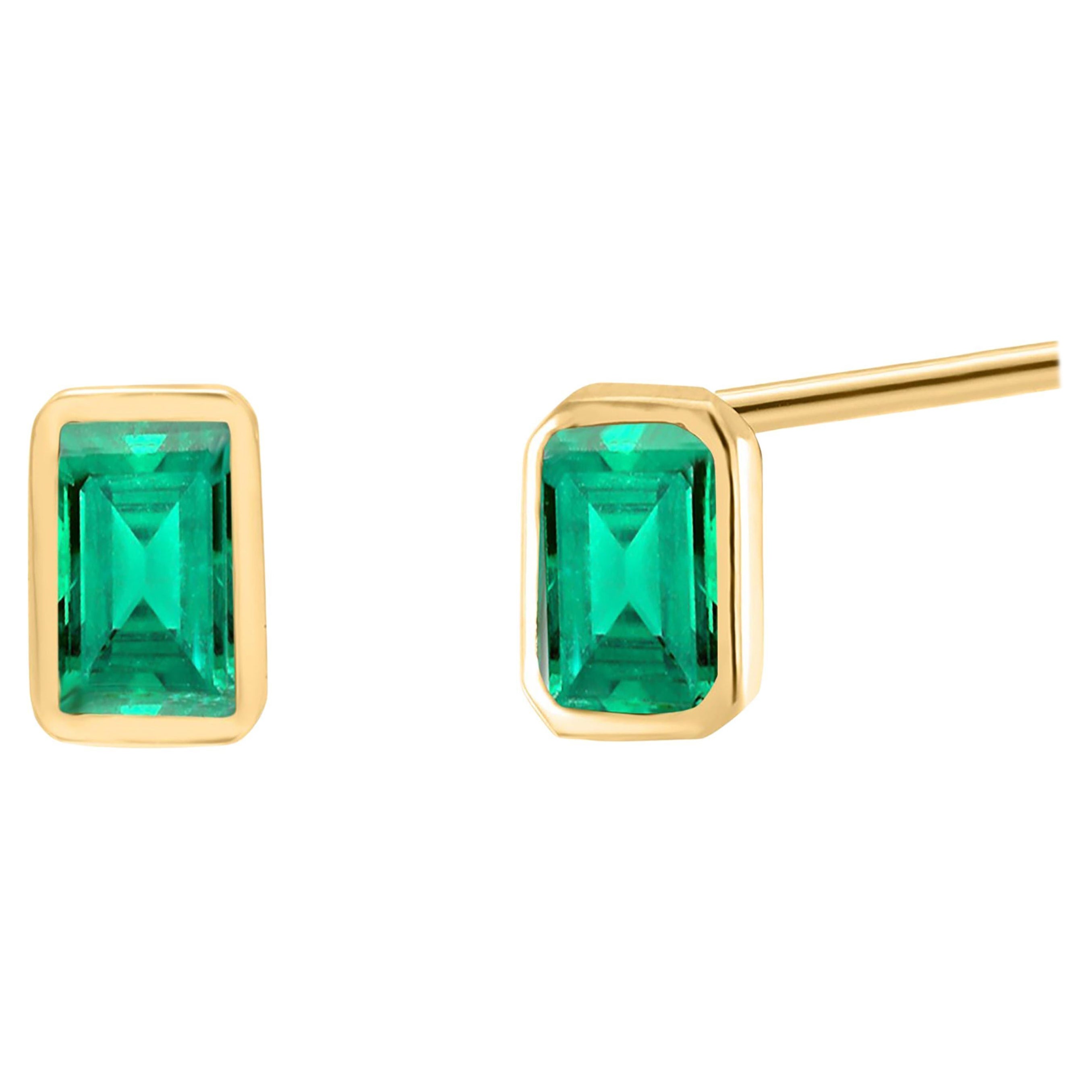 Emerald Shaped Colombia Emerald 0.65Carat Bezel Set Yellow Gold Stud Earrings For Sale