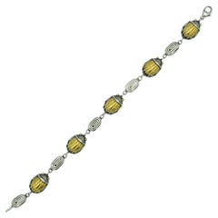 1993 Tiffany & Co. Bracelet à maillons scarabée en or 18k et argent sterling 925