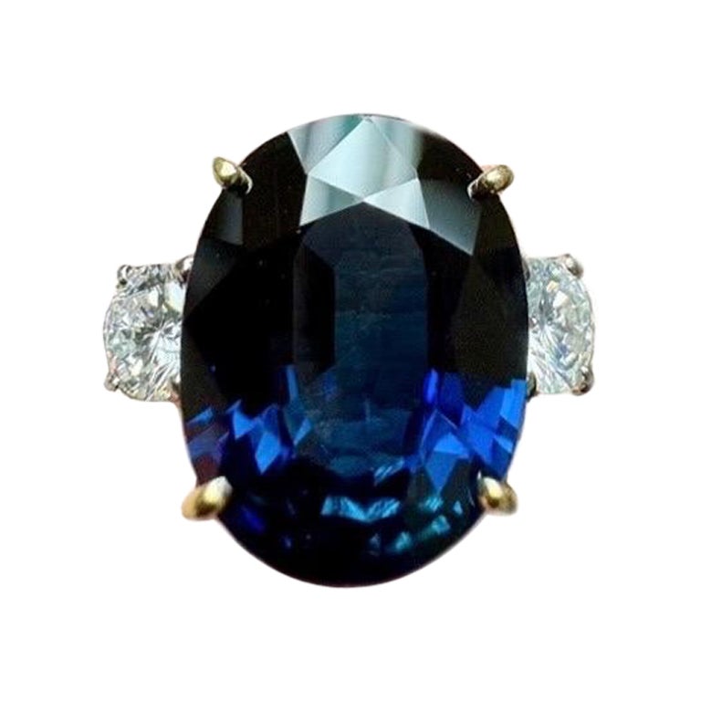 Three Stone Platinum Diamond 7.85 Carat Oval Peacock Sapphire Engagement Ring For Sale
