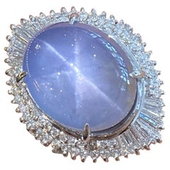 Großer 23,95 Karat ovaler Sternsaphir und Diamant-Ballerina-Ring aus Platin