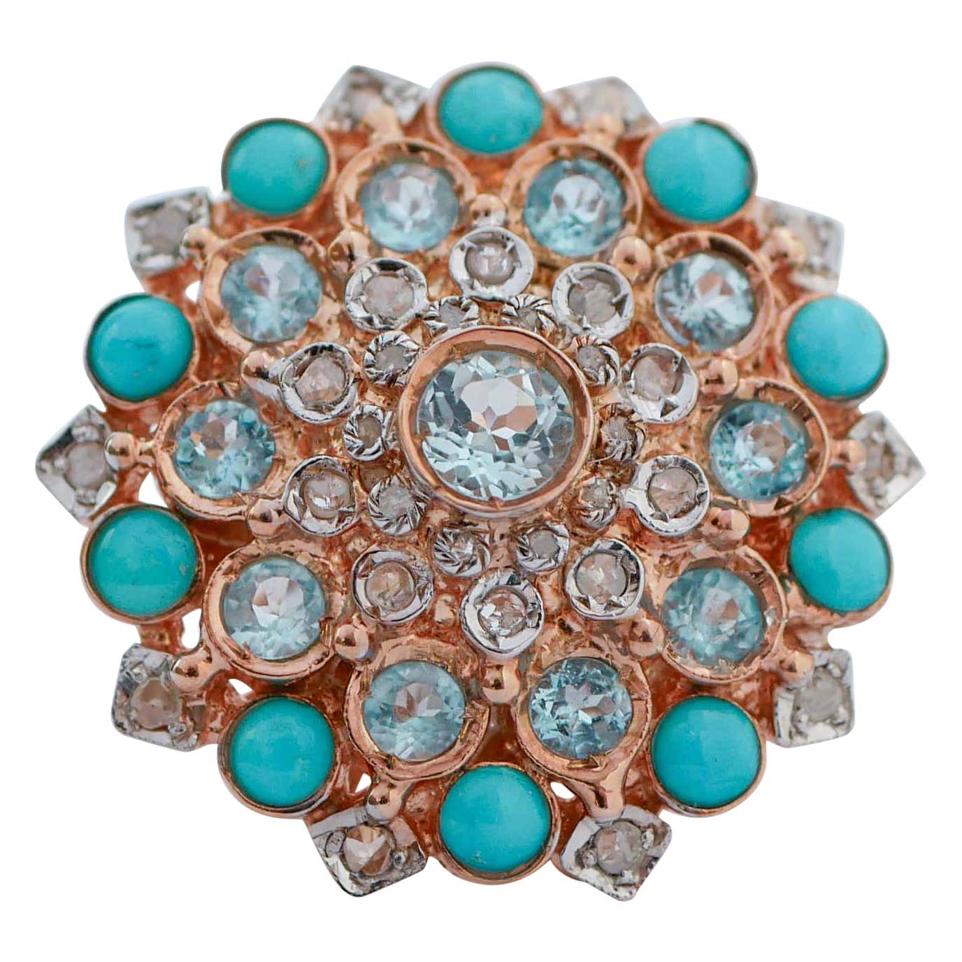 Bague en or rose et argent avec turquoise, topaze de couleur aigue-marine, diamants