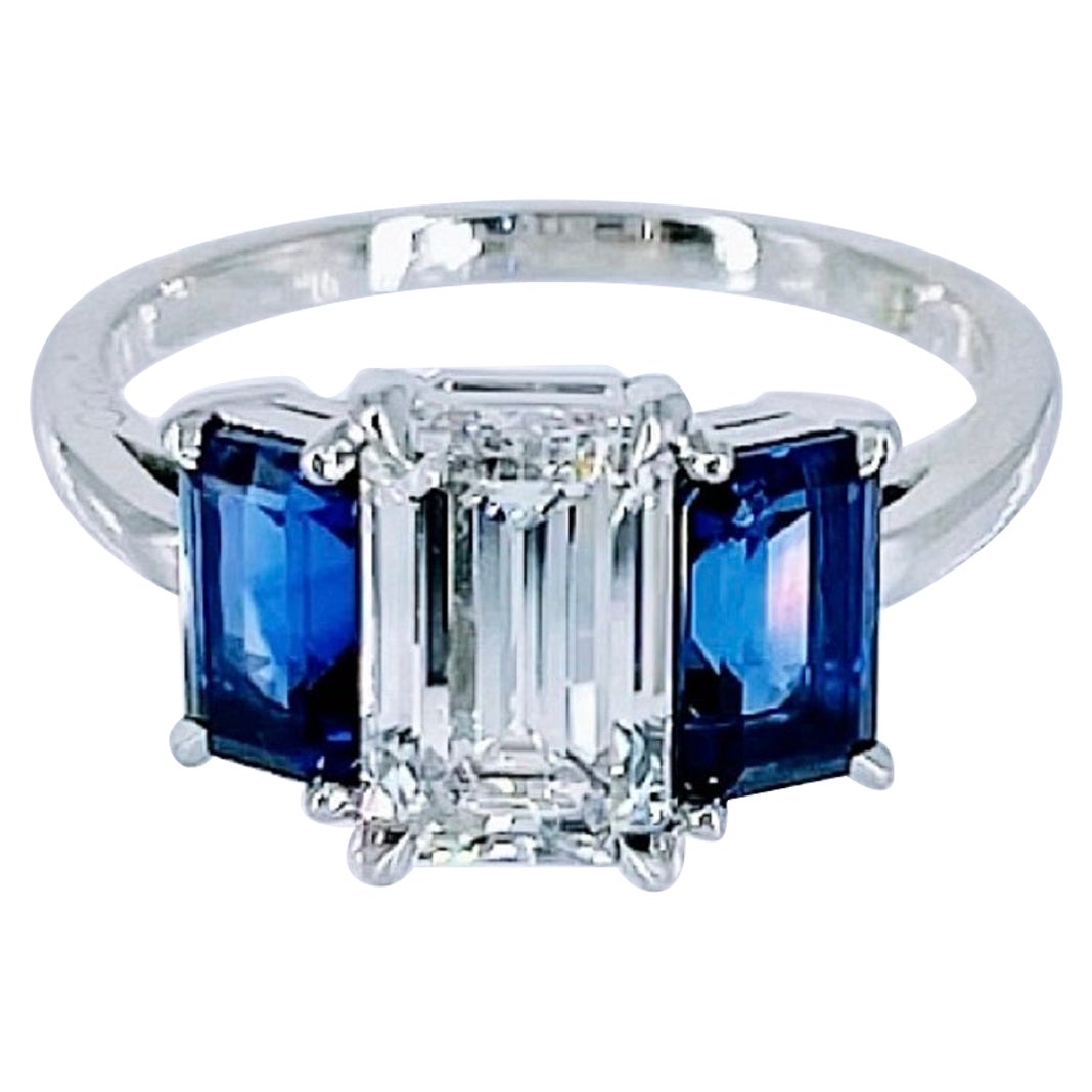Cartier 1.55 carat GIA FVVS1 Emerald Cut Diamond Three Stone Ring with Sapphires For Sale