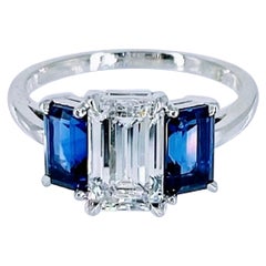 Antique Cartier 1.55 carat GIA FVVS1 Emerald Cut Diamond Three Stone Ring with Sapphires