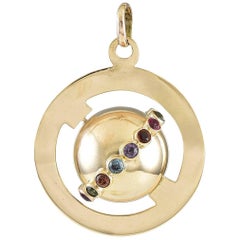 The Great Around the World Gemset Gold Charm