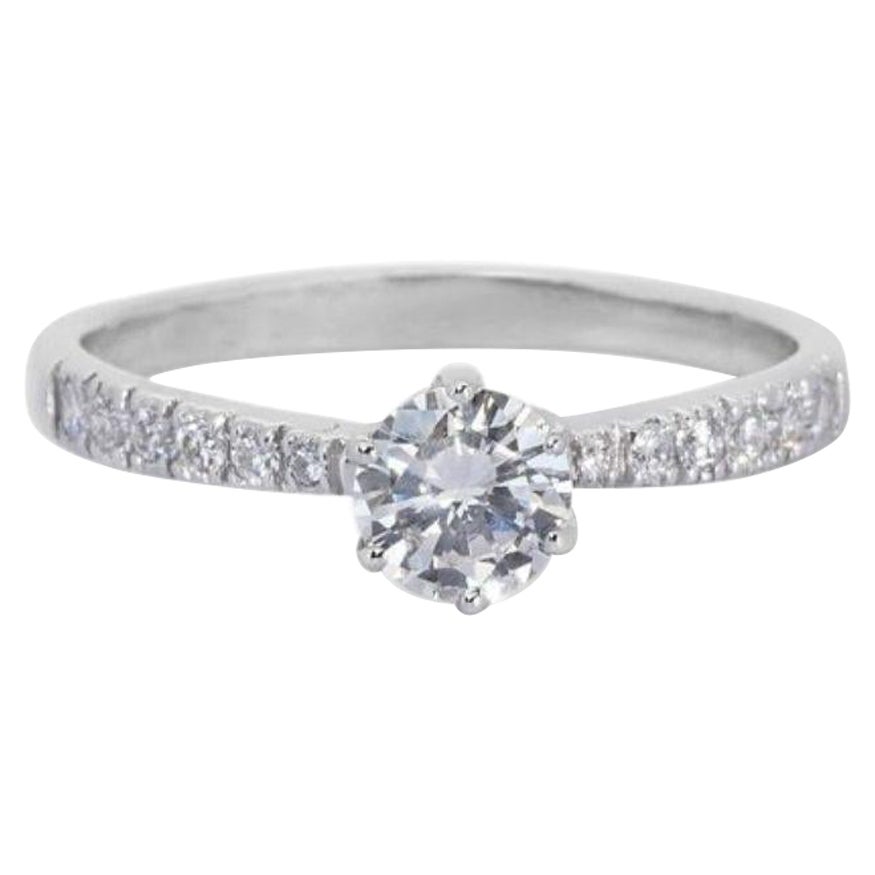 Elegant 0.72 Carat Round Diamond Ring For Sale