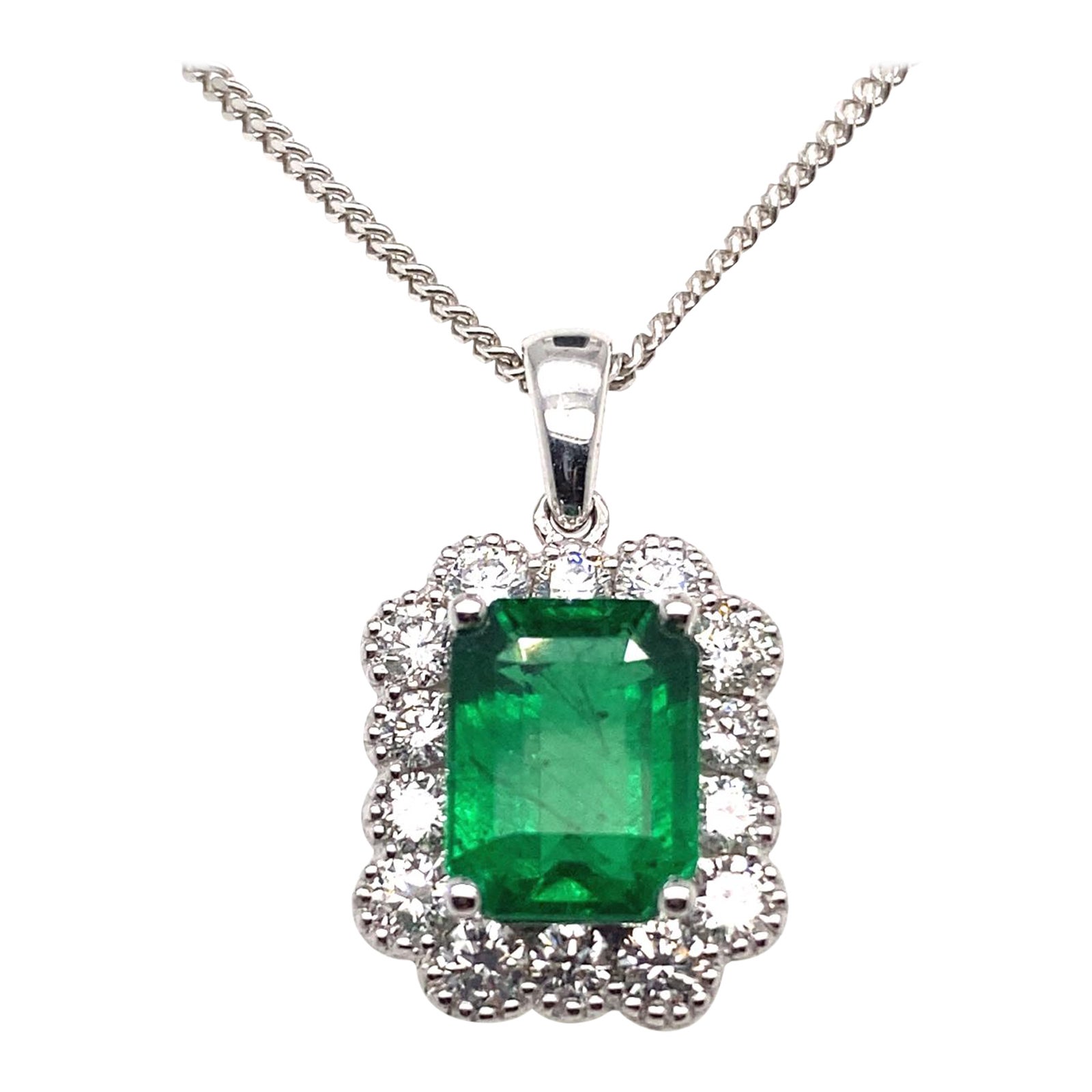 Emerald and Diamond Cluster Pendant 18 Karat White Gold For Sale