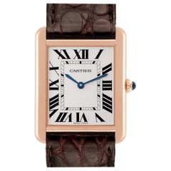 Cartier: Große Herrenuhr Tank Solo aus Roségold mit braunem Stahlarmband, W5200025