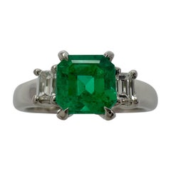 1.04ct Fine Green Colombian Emerald And Diamond Platinum Three Stone Ring