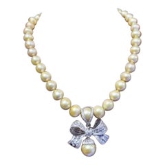 Perle dei mari del sud dorate certificate GIT  Collana in oro 18 carati con diamanti