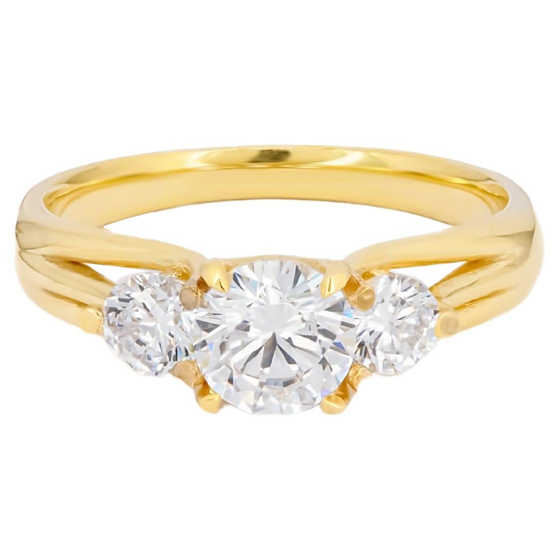 3 round moissanite 14k gold engagement ring.