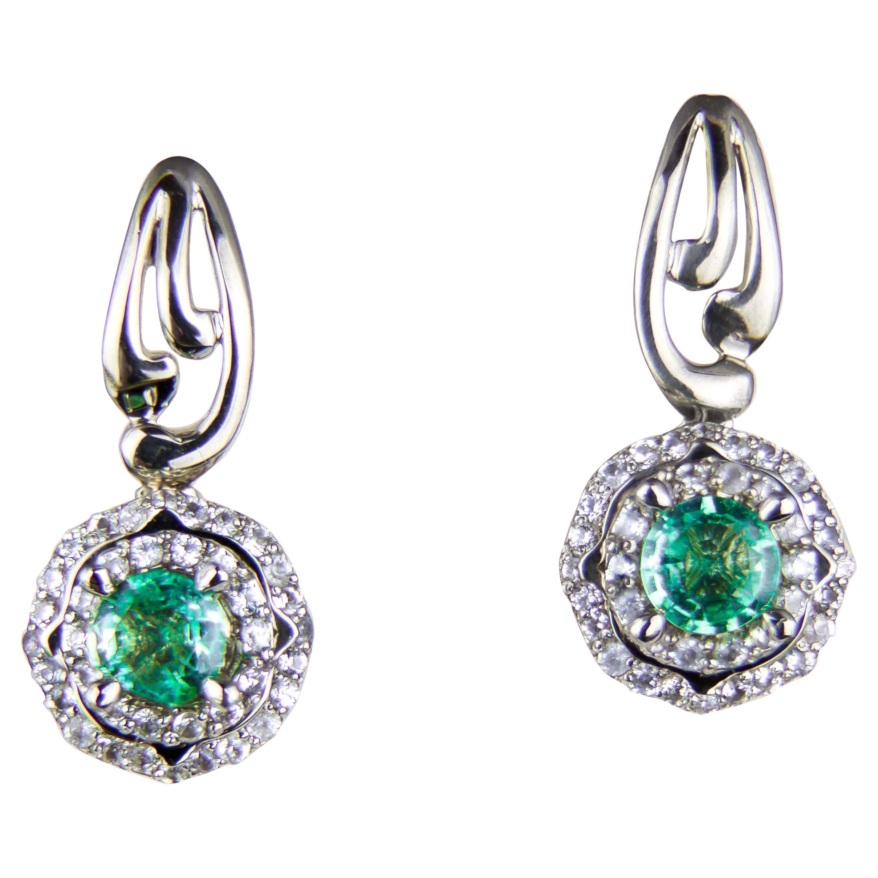 Emeralds 14k gold earrings studs.   For Sale