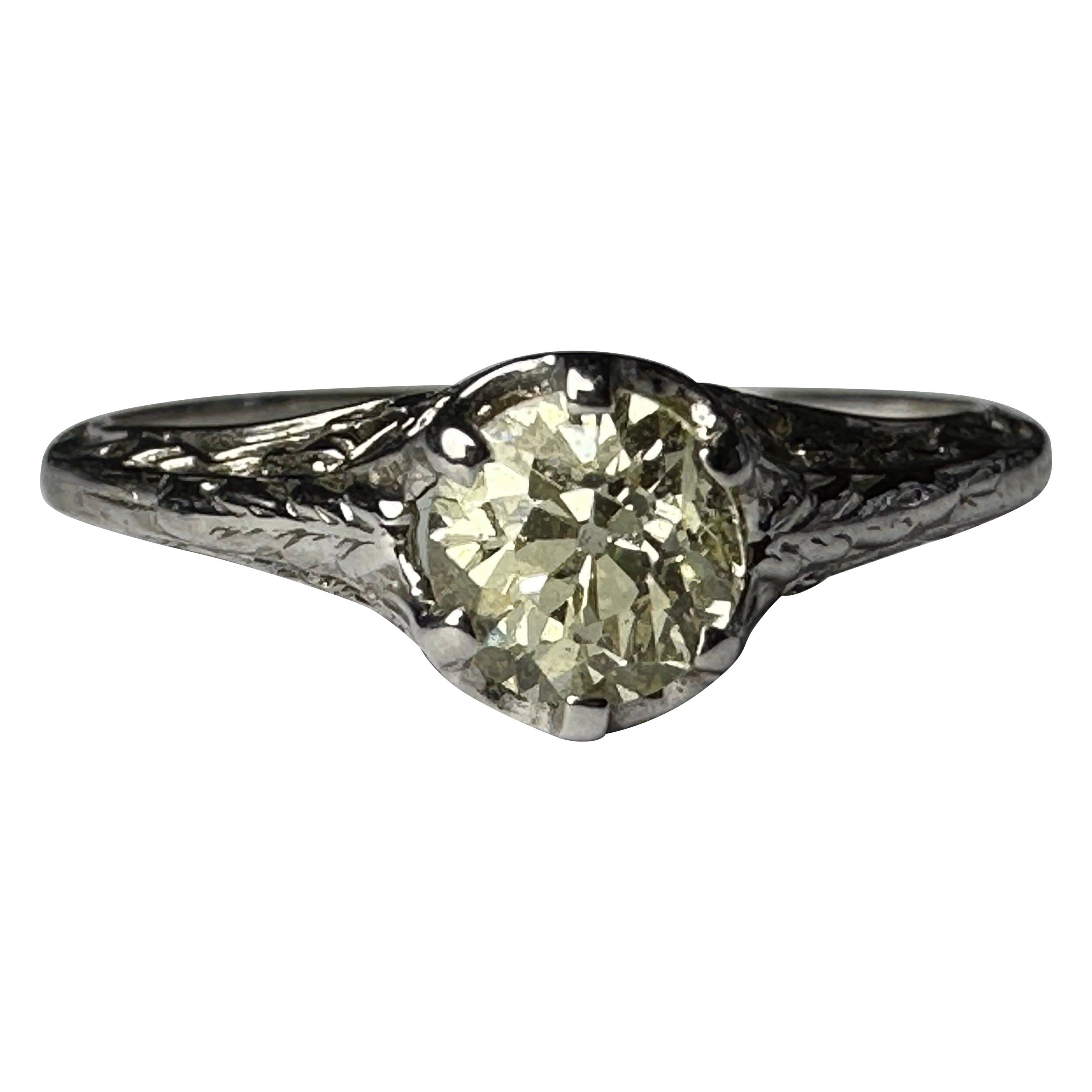 Art Deco Fancy Pale Yellow Diamond Solitaire and Filigree Ring  For Sale