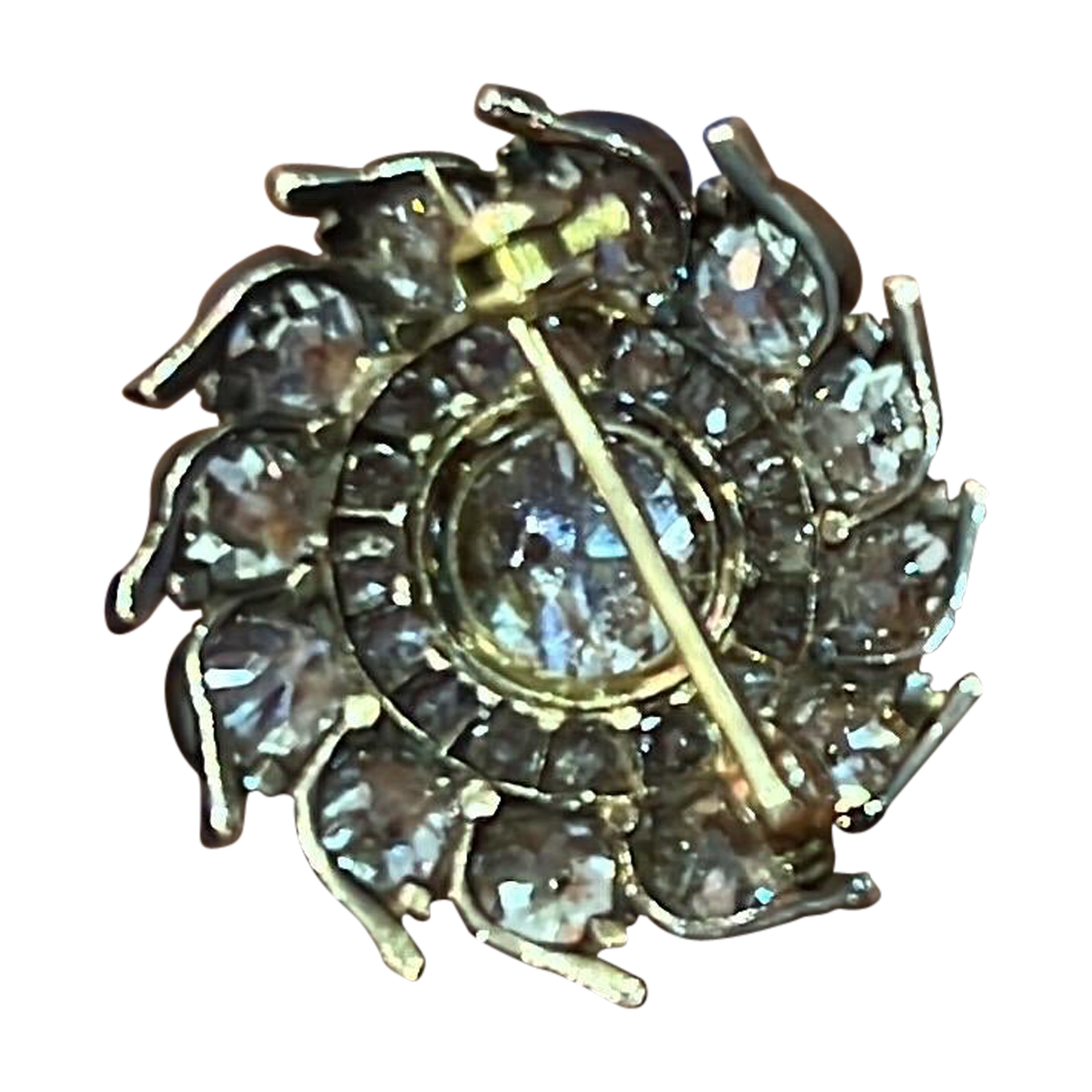 A stunning diamond pin with about 1.50 carat center stone. It's a true old brooch from the 18th century. Fine piece of you want to wear . This can not be recreated 