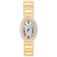 Cartier Baignoire Mini Montre pour femme en or jaune et diamants WB5094D8