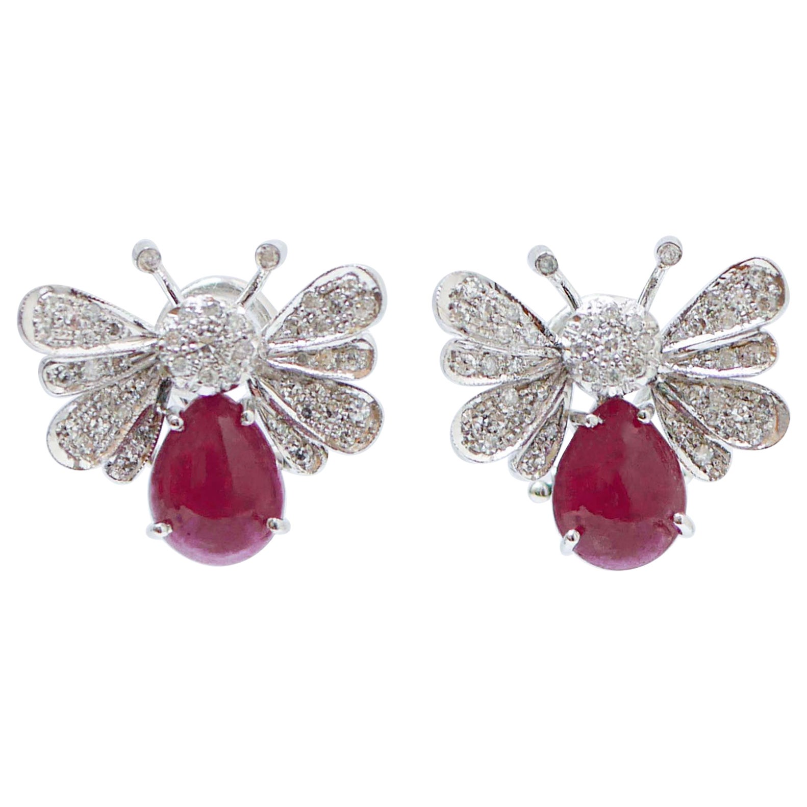 Rubies, Diamonds, Platinum and 14 Karat White Gold Butterfly Earrings. For Sale